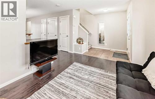 822 Panatella Boulevard Nw, Calgary, AB - Indoor Photo Showing Living Room