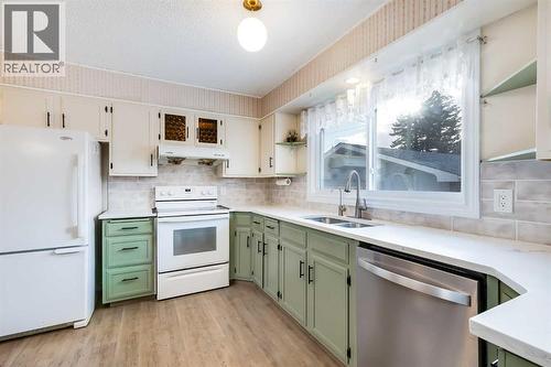 5611 Maidstone Crescent Ne, Calgary, AB - Indoor Photo Showing Kitchen With Double Sink