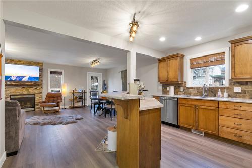 1-1605 43 Avenue, Vernon, BC - Indoor Photo Showing Kitchen With Fireplace
