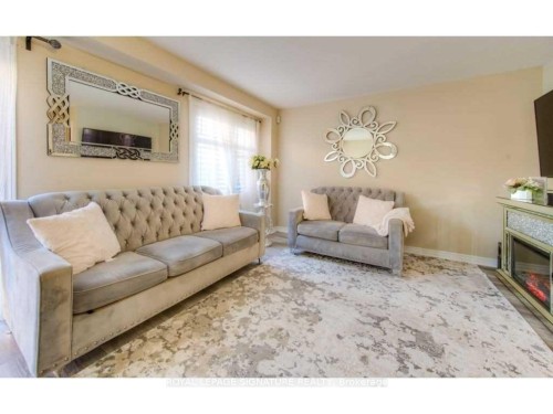 30 Pumpkin Pass, Hamilton, ON - Indoor Photo Showing Living Room With Fireplace