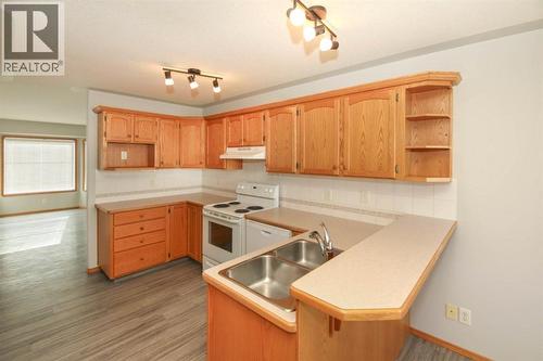 33 Duckering Close, Red Deer, AB - Indoor Photo Showing Kitchen With Double Sink