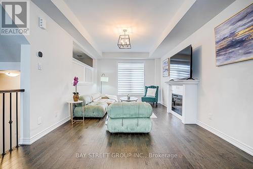 19 Morrison Crescent, Whitby, ON - Indoor Photo Showing Living Room With Fireplace
