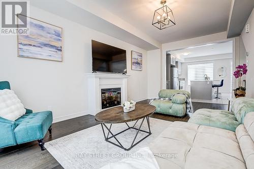 19 Morrison Crescent, Whitby, ON - Indoor Photo Showing Living Room With Fireplace