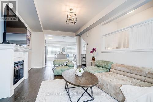 19 Morrison Crescent, Whitby, ON - Indoor Photo Showing Living Room With Fireplace