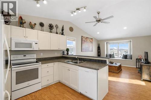 57 Garden Road, Lacombe, AB - Indoor Photo Showing Kitchen With Double Sink