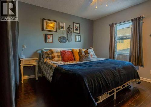 Primary Bedrm - 502 5 Avenue, Wainwright, AB - Indoor Photo Showing Bedroom