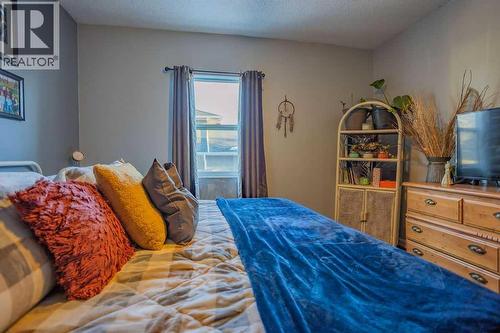 Primary Bedrm - 502 5 Avenue, Wainwright, AB - Indoor Photo Showing Bedroom