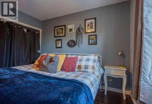 Primary Bedrm - 502 5 Avenue, Wainwright, AB - Indoor Photo Showing Bedroom