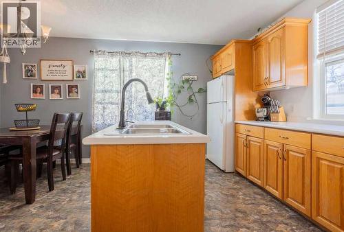 Kitchen/Dining Rm - 502 5 Avenue, Wainwright, AB - Indoor Photo Showing Kitchen With Double Sink