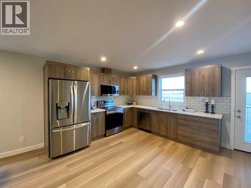 4213 57 Street, Taber, AB - Indoor Photo Showing Kitchen With Stainless Steel Kitchen With Double Sink