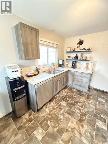 223 4Th Street, Weyburn, SK - Indoor Photo Showing Kitchen With Double Sink