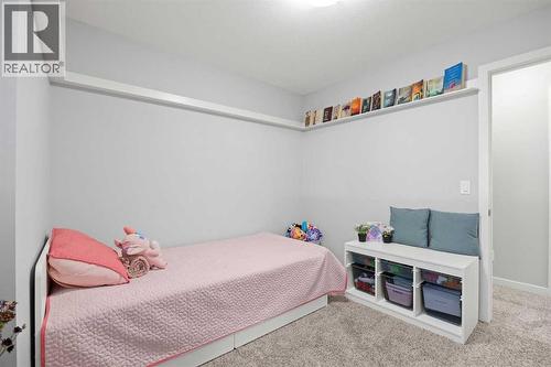 1027 Lanark Boulevard Se, Airdrie, AB - Indoor Photo Showing Bedroom
