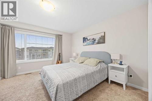 1027 Lanark Boulevard Se, Airdrie, AB - Indoor Photo Showing Bedroom