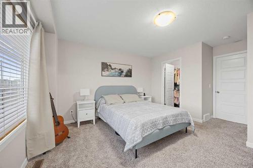1027 Lanark Boulevard Se, Airdrie, AB - Indoor Photo Showing Bedroom