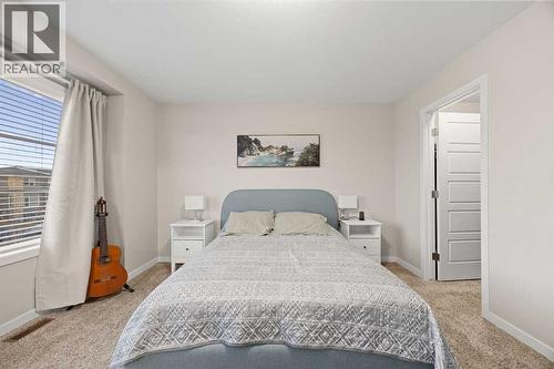 1027 Lanark Boulevard Se, Airdrie, AB - Indoor Photo Showing Bedroom