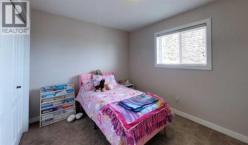 #1, 6615 5Th Avenue, Edson, AB - Indoor Photo Showing Bedroom