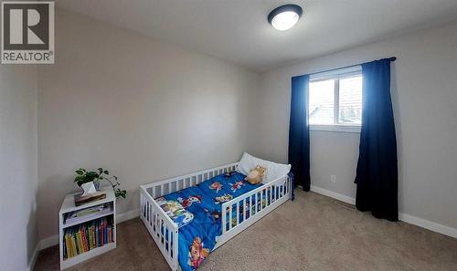 #1, 6615 5Th Avenue, Edson, AB - Indoor Photo Showing Bedroom