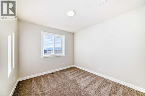 241 Bridgeport Gate, Chestermere, AB - Indoor Photo Showing Other Room