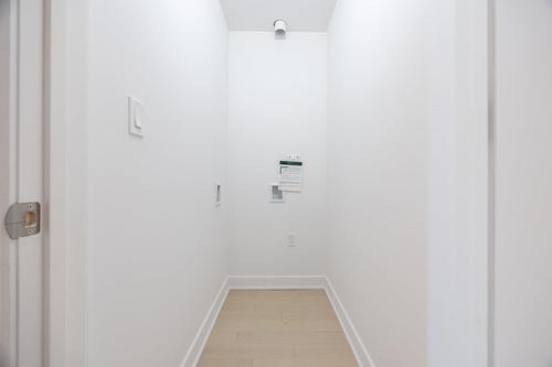 Salle de lavage - 103-505 Rue De L'Escale, Brossard, QC - Indoor Photo Showing Other Room