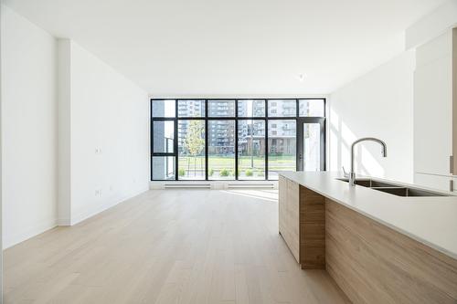 Salon - 103-505 Rue De L'Escale, Brossard, QC - Indoor Photo Showing Kitchen With Double Sink