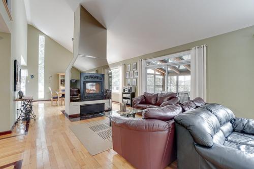 Living room - 227 Ch. Millette, Lac-Des-Seize-Îles, QC - Indoor Photo Showing Living Room With Fireplace