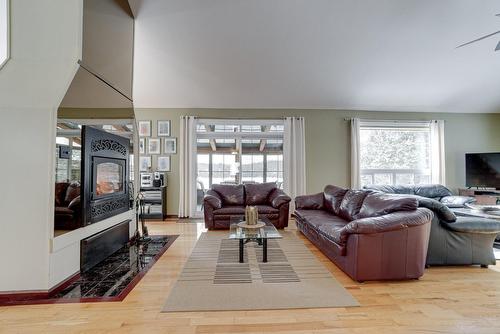 Living room - 227 Ch. Millette, Lac-Des-Seize-Îles, QC - Indoor Photo Showing Living Room With Fireplace