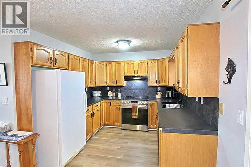 97 Cunningham Crescent, Red Deer, AB - Indoor Photo Showing Kitchen