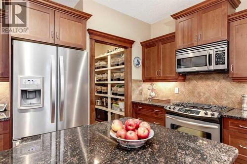47 Tuscany Estates Close Nw, Calgary, AB - Indoor Photo Showing Kitchen With Stainless Steel Kitchen With Upgraded Kitchen