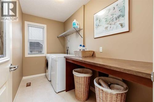 47 Tuscany Estates Close Nw, Calgary, AB - Indoor Photo Showing Laundry Room