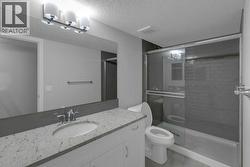 Basement 3 piece bathroom with granite countertops - 