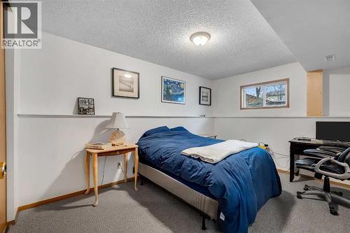 192 Rivercrest Close Se, Calgary, AB - Indoor Photo Showing Bedroom