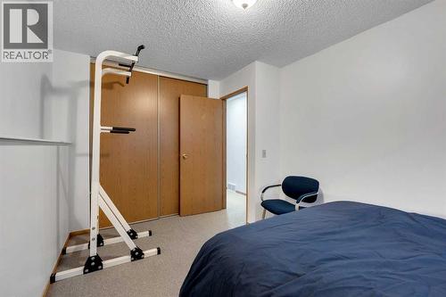 192 Rivercrest Close Se, Calgary, AB - Indoor Photo Showing Bedroom