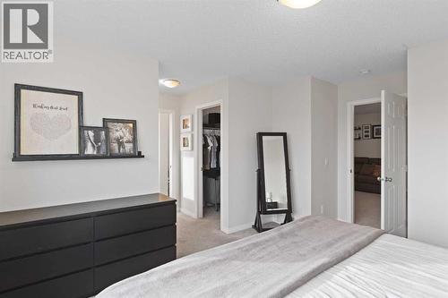 169 Buckskin Way, Cochrane, AB - Indoor Photo Showing Bedroom