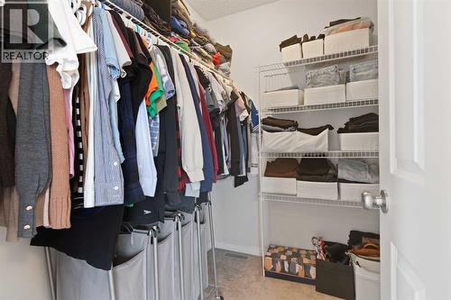 169 Buckskin Way, Cochrane, AB - Indoor With Storage