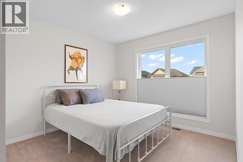 169 Buckskin Way, Cochrane, AB - Indoor Photo Showing Bedroom