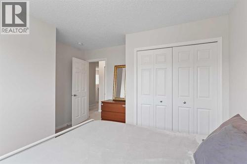 169 Buckskin Way, Cochrane, AB - Indoor Photo Showing Bedroom