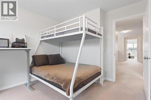 169 Buckskin Way, Cochrane, AB - Indoor Photo Showing Bedroom