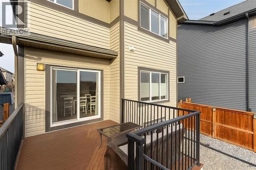 169 Buckskin Way, Cochrane, AB - Outdoor With Deck Patio Veranda With Exterior