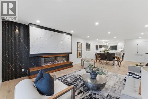 11039 Brae Road Sw, Calgary, AB - Indoor Photo Showing Living Room With Fireplace