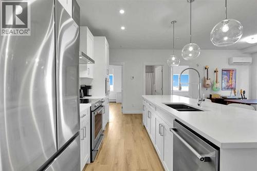 2216, 200 Seton Circle Se, Calgary, AB - Indoor Photo Showing Kitchen With Double Sink With Upgraded Kitchen