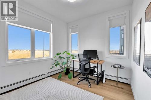 2216, 200 Seton Circle Se, Calgary, AB - Indoor Photo Showing Office