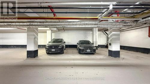 607 - 560 North Service Road, Grimsby, ON - Indoor Photo Showing Garage