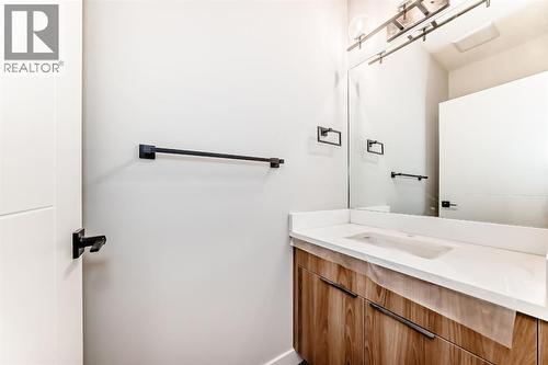 Powder Room - 508 Heritage Boulevard, Cochrane, AB - Indoor Photo Showing Bathroom