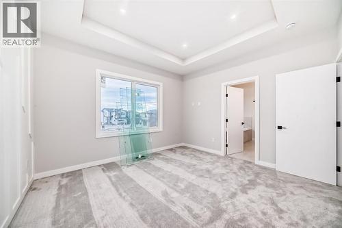 508 Heritage Boulevard, Cochrane, AB - Indoor Photo Showing Other Room