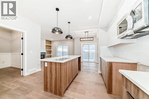 508 Heritage Boulevard, Cochrane, AB - Indoor Photo Showing Kitchen