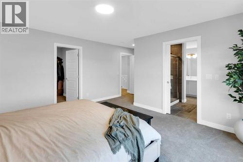 287 Rivercrest Boulevard, Cochrane, AB - Indoor Photo Showing Bedroom