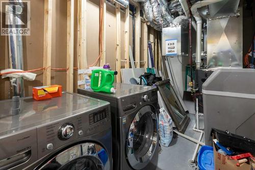 287 Rivercrest Boulevard, Cochrane, AB - Indoor Photo Showing Laundry Room