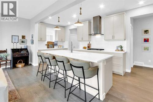287 Rivercrest Boulevard, Cochrane, AB - Indoor Photo Showing Kitchen With Upgraded Kitchen