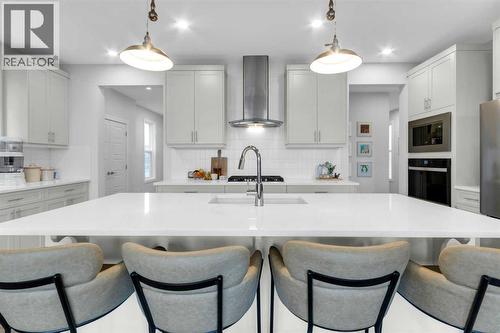 287 Rivercrest Boulevard, Cochrane, AB - Indoor Photo Showing Kitchen With Upgraded Kitchen