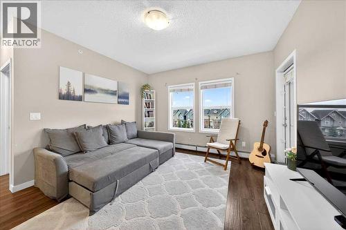 302, 200 Cranfield Common Se, Calgary, AB - Indoor Photo Showing Living Room